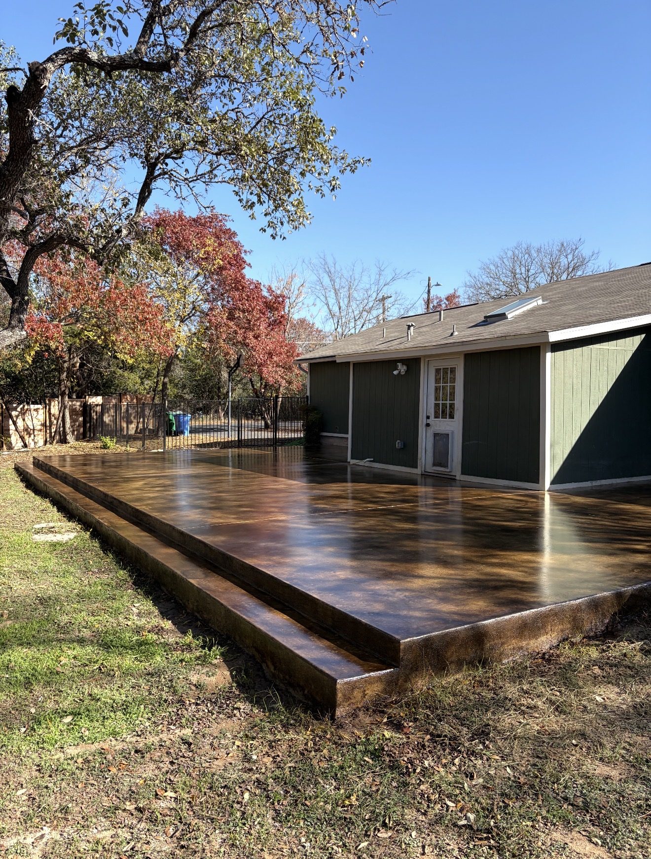 Amber acid-stained concrete patio